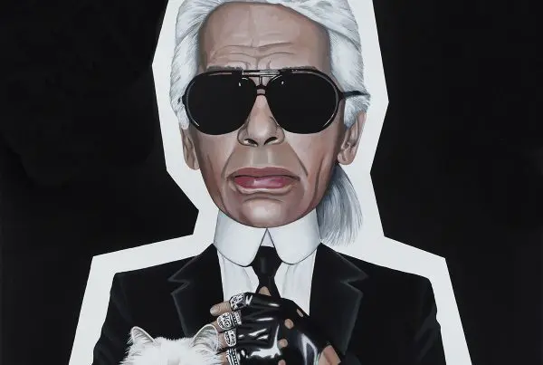 Painting of Karl Lagerfeld with a cat.