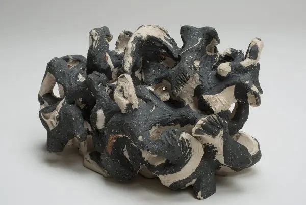 Black and white abstract ceramic sculpture.