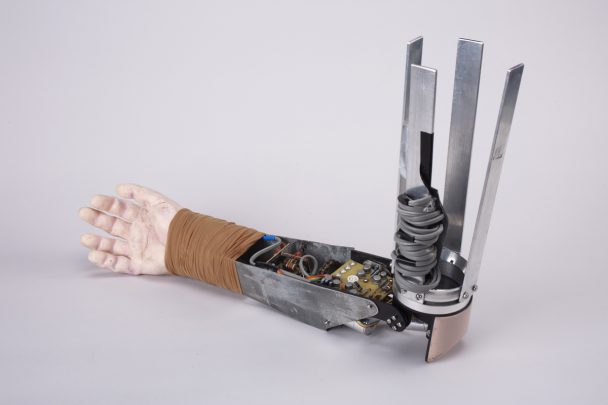 A robotic arm with a realistic hand.