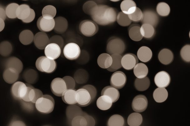 Brown and white blurred Christmas lights.